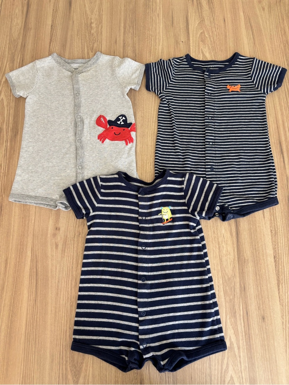 carter’s striped rompers 12M lot of 3